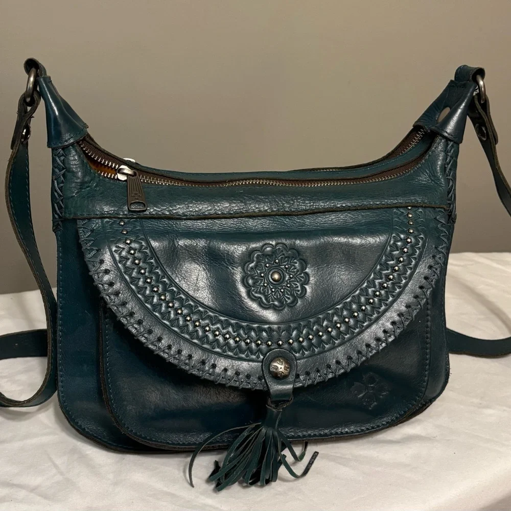 Patricia Nash Blue Shoulder Bag with Embossed Design and Tassel - Picture 1 of 12
